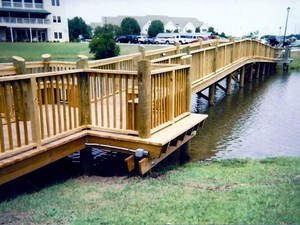 A bridge crossing a large pond